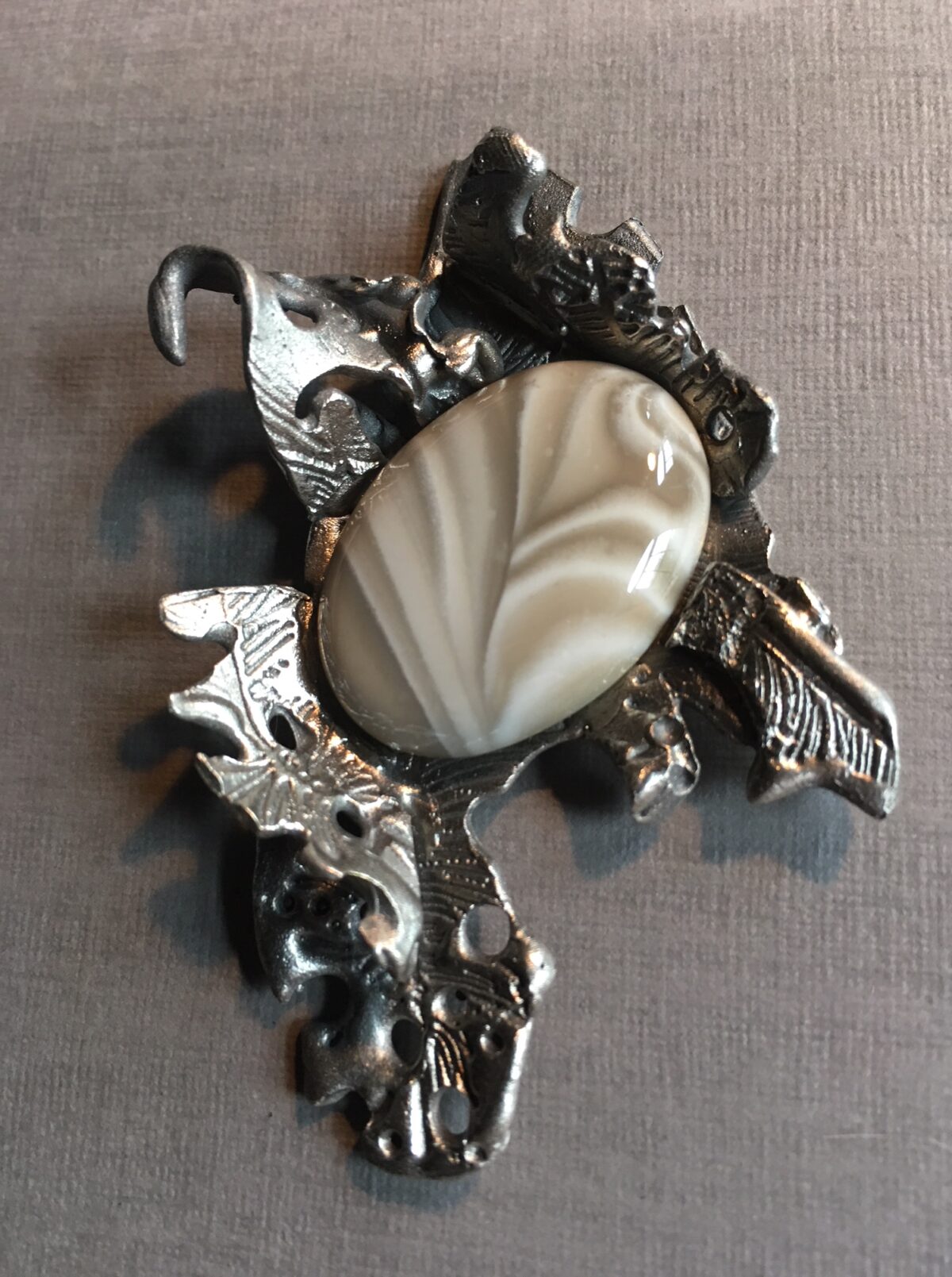 Cast silver pendant